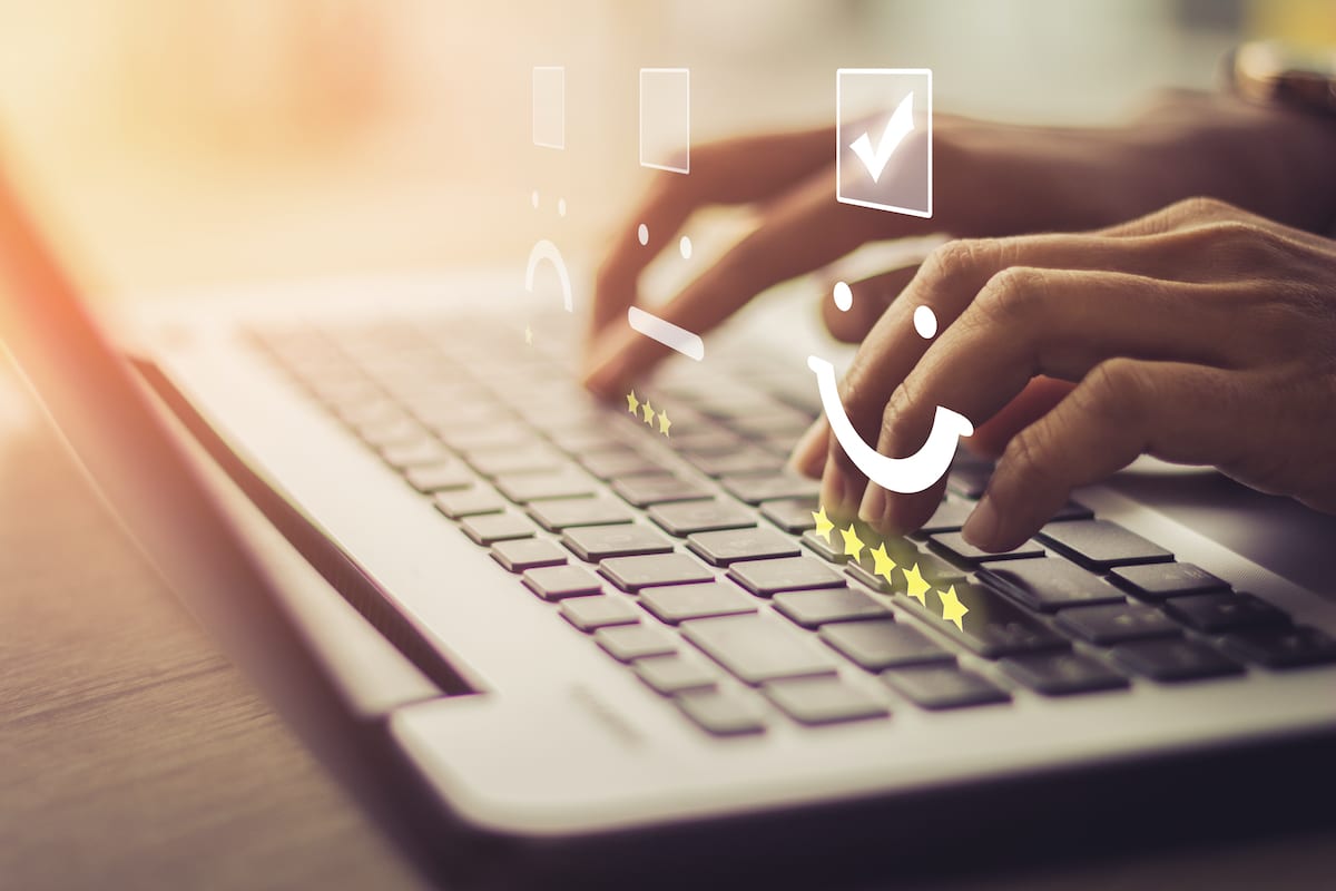 OnlineReputationManagement Hands on laptop typing reviews